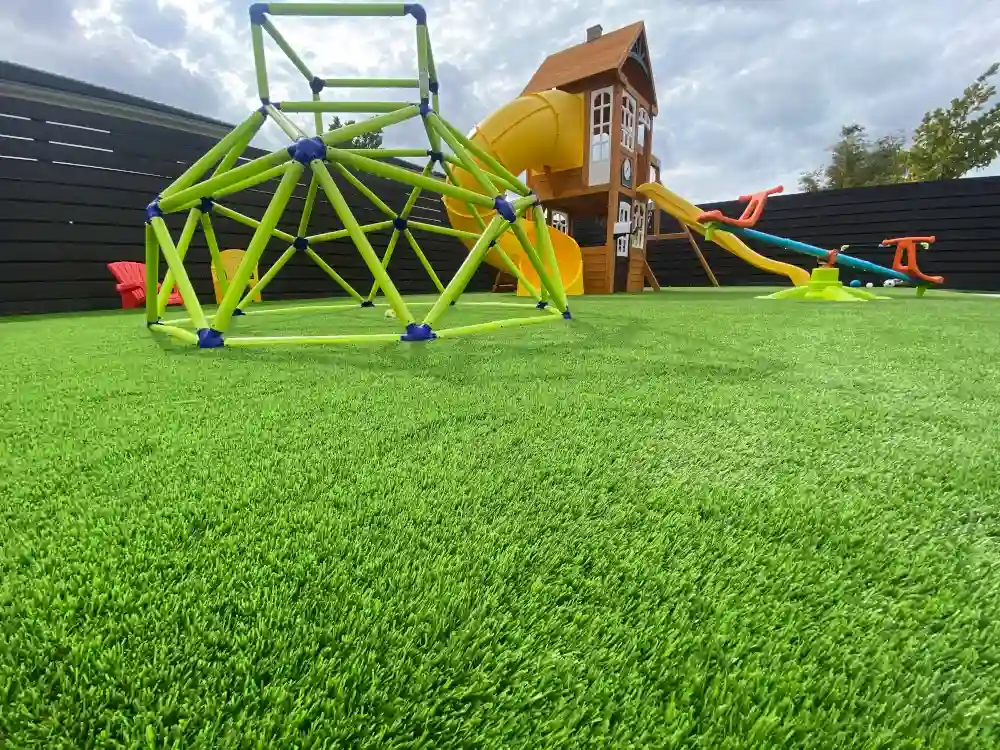 kids play ground with products from top turf artificial grass