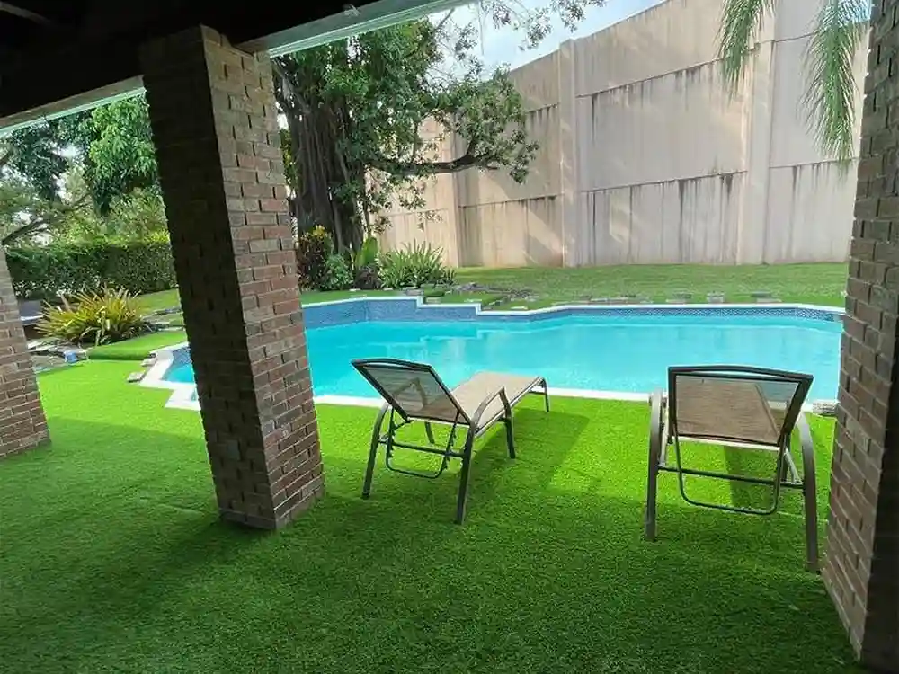 pool with products from top turf artificial grass