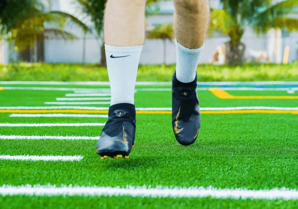soccer player on artificial grass by top turf gallery image